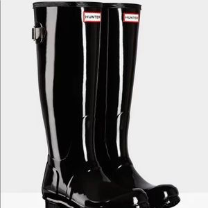 Shiny black tall hunter rain boots